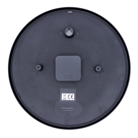 back side of wall clock shoing battery compartment and wall mounting options